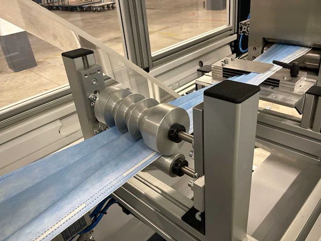 Nucleus machine voor assemblage mondmaskers - afbeelding 11 van  27