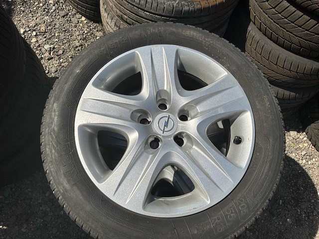 Opel 16 inch set van 4 banden voor opel + velgen taule + wieldop - afbeelding 1 van  11
