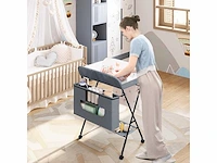 Opvouwbare en in hoogte verstelbare baby-commode met wielen, opbergmand, metalen frame, oxford-doek, grijs