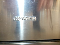 Oven multi functioneel in inox met 6 vuurpitten, merk smeg, met achterplaat en dampkap (siemens) - afbeelding 3 van  12