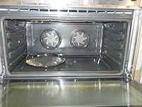 Oven multi functioneel in inox met 6 vuurpitten, merk smeg, met achterplaat en dampkap (siemens) - afbeelding 7 van  12