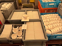 Partij koffietassen en onderzetters