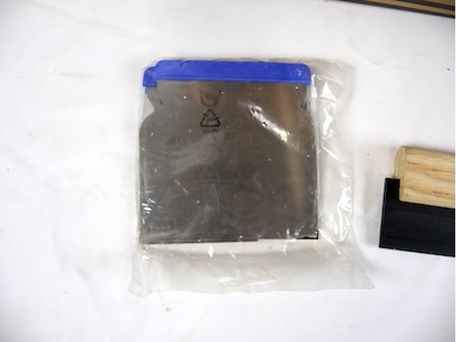 Partij lijmen en pleisteren - afbeelding 3 van  7