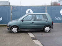Personenauto subaru justy benzine 93pk 2005 (marge) - afbeelding 1 van  1