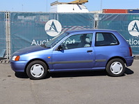 Personenauto toyota starlet benzine 68pk 1997 (marge) - afbeelding 1 van  1