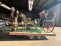Praalkoets op aanhangwagen