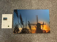 Print “windmill at sunset”