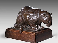 Rembrandt bugatti (1884-1916), 'jaguar accroupi (petit modèle)', patinated bronze, cast by a.a. hébrard, n° 18/51 10.5 x 19.6 cm. (4.12 x 7.71 in.), frame: 13.5 x 17.5 cm. (5.30 x 6.88 in.)