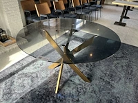 Ronde tafel met glazen bovenblad