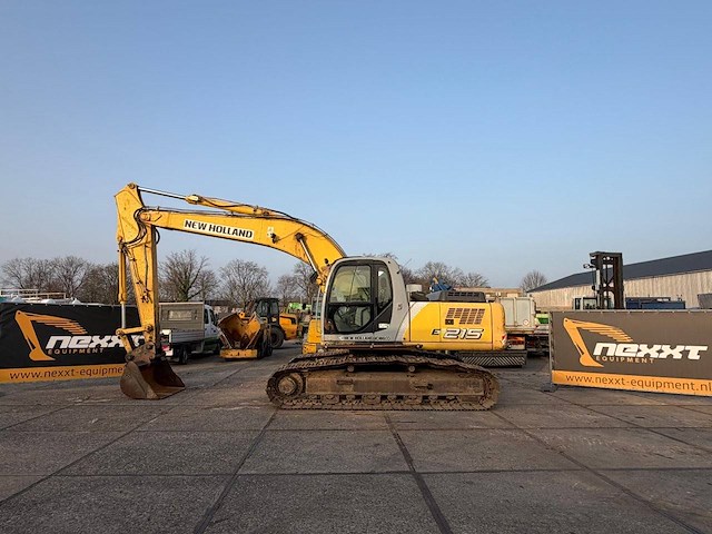 Rupsgraafmachine new holland kobelco e215 diesel 119kw 2006 - afbeelding 1 van  1