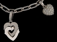 Santos de cartier charm bracelet in 18ct white gold, with diamond charms, weight: 37,8 g (+) - afbeelding 6 van  18