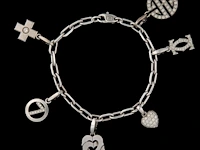 Santos de cartier charm bracelet in 18ct white gold, with diamond charms, weight: 37,8 g (+)
