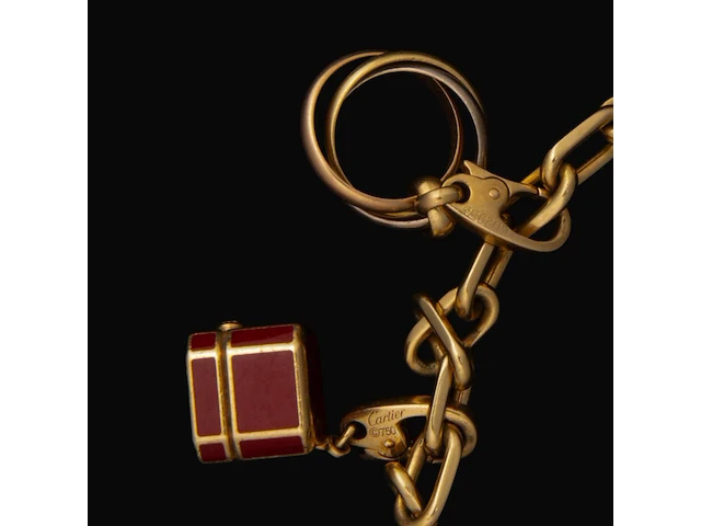 Santos de cartier charm bracelet in 18ct yellow gold, with diamond charms, weight: 46,3 g (+) - afbeelding 3 van  16
