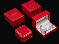 Santos de cartier charm bracelet in 18ct yellow gold, with diamond charms, weight: 46,3 g (+) - afbeelding 8 van  16