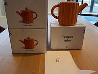 Set oranje thee-potten