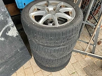 Set van 4 winterbanden firestone winterhawk 195/50 r15 op lichtmetalen velgen