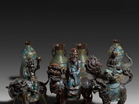Seven japanese champlevé enameled bronzes; three figures riding a shishi and two pairs of vases, 19th/20thc, tallest h 46,5 cm