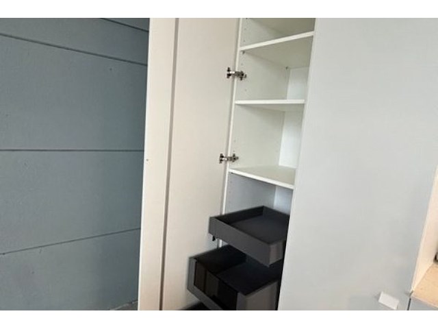 Showroomkeuken met eiland en toestellen - afbeelding 17 van  41