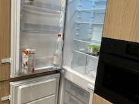 Showroomkeuken met eiland en toestellen - afbeelding 25 van  43