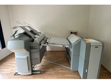 Snelveiling plotter canon + vouwmachine estefold