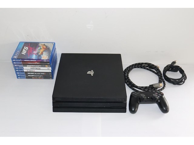 Sony playstation 4 pro 1tb black met 8 games - afbeelding 1 van  7