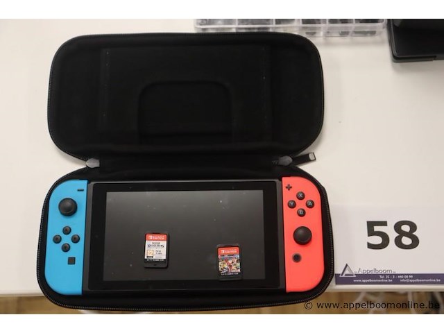 Spelconsole nintendo switch plus 2 spelletjes, zonder kabels werking niet gekend - afbeelding 1 van  4