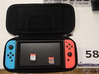 Spelconsole nintendo switch plus 2 spelletjes, zonder kabels werking niet gekend - afbeelding 1 van  4