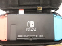Spelconsole nintendo switch plus 2 spelletjes, zonder kabels werking niet gekend - afbeelding 4 van  4
