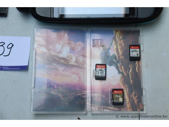 Spelconsole nintendo switch vv 3 spelletjes, zonder kabels, werking niet gekend - afbeelding 3 van  4