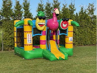 Springkasteel flamingo met glijbaan