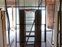 Stalen schuifdeur met glas