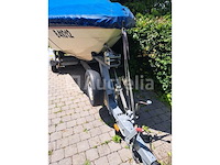 Starcraft 1710 recreatieve binnenboordboot in gebruik, dubbelassige aanhanger, accessoires - afbeelding 13 van  29