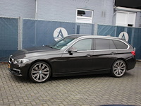 Stationwagen bmw 330i benzine 252pk 2018 - afbeelding 1 van  1