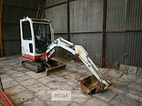 Takeuchi minigraver