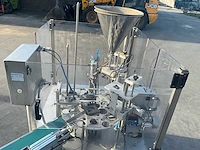 Techniplast automatische draaipotvullings-/verpakkingsmachine techniplast – automatische draaipotvullings- en verpakkingsmachine – yoghurt / voedingsproducten – roestvrij staal - afbeelding 18 van  22