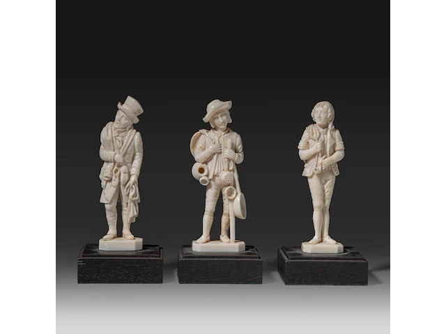 Three ivory sculptures on wooden bases depicting young men of various professions, signed migeon, 19thc, all total h 13 cm - ivory h 11 cm - total weight (together) ca. 400g (+) - afbeelding 1 van  6