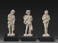 Three ivory sculptures on wooden bases depicting young men of various professions, signed migeon, 19thc, all total h 13 cm - ivory h 11 cm - total weight (together) ca. 400g (+)