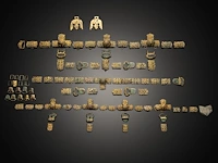 Three sets of chinese gilt bronze repoussé and open-work strap plaques or horse trappings with floral motifs, liao dynasty (907–1125)