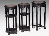 Three tall chinese carved hardwood stands, including a pair and all set with a marble top, late qing, h 80 - 83 cm