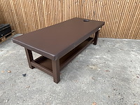 Traditionele massagetafel