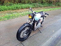 Triumph - bonneville t 100 cafe racer - motorfiets - afbeelding 9 van  11