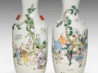 Two chinese famille rose vases, both decorated with a scene of playful boys and signed at the back, paired with lion head handles, republic period, h 58cm