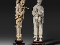 Two chinese ivory sculptures of fishermen, late qing dynasty (1850-1912), ivory h 25 cm - ivory 370g / ivory h 24 cm - total weight 477g (+)