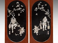Two fine japanese shibayama inlaid black lacquered panels, depicting a man and child under a blossoming cherry branch, signed, meiji period (1868-1912), h 136 cm x 60 cm - each 8 kg (+)