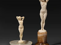 Two ivory art deco nude sculptures by joe descomps (1869-1950), signed, interwar period, total h 16 cm - ivory h 11 cm - 161g / total h 9,5 cm - ivory h 8,5 cm - 83g (+)