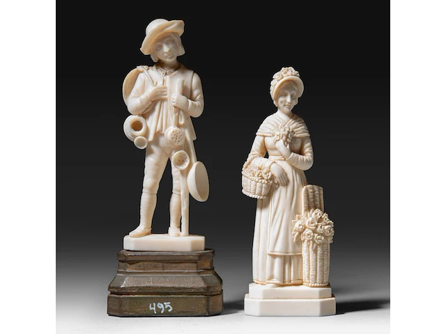 Two ivory sculptures of a boy and a lady with flowers, signed f. migeon, total h 14 cm - ivory h 11 cm - 134g / h 13 cm - 98g (+) - afbeelding 1 van  7