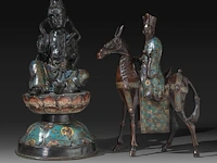 Two japanese champlevé enameled bronzes, one of kannon, the other an immortal riding a horse, meiji period (1868-1912), h 43 cm / h 40 cm