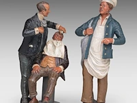 Two polychrome terracotta figures of a barber and a baker, attrib. to bernhardt bloch (1836-1909) the baker: 29 cm. (11.41 in.), the barber: 26 cm. (10.24 in.)