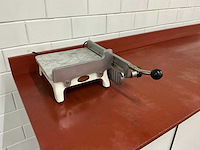 Unika - verwarmde hand kaassnijder - afbeelding 1 van  3