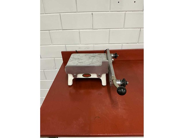 Unika - verwarmde hand kaassnijder - afbeelding 2 van  3